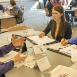 During spring semester, students in a UW-La Crosse Labor Economics course assisted community clients with labor market research. Here UWL students Shaun Fleischhacker and Marissa Eckrote, both right, meet with client, Sarah Fecht, vice president of human resources at Community Credit Union, for a round table discussion.