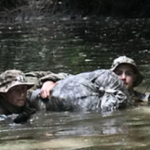 Photo of Douglas Machkovech (left) participating in an Army jungle operations course in Hawaii. (Photo courtesy of Douglas Machkovech)