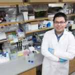Photo of Quanyin Hu in his laboratory. Photo by Todd Brown/UW–Madison