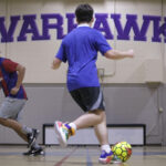Photo of soccer players scrimmaging in Frank Holt Gymnasium at the UW-Whitewater Rock County campus on April 18, 2024. (UW-Whitewater photo/Craig Schreiner)