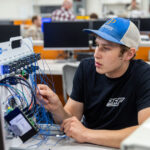 Photo of a student working in the Electronics and Automation Lab.