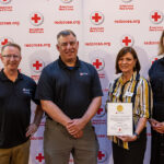 Photo of UW-Superior receiving Red Cross Award: The University of Wisconsin-Superior was recently named International Services Partner of the Year by the Red Cross. The award recognizes the mutually beneficial partnership of UW-Superior and the Red Cross.