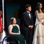 Photo of Hannah Smith, a communication major at the University of Wisconsin-Whitewater, second from left, who took the words of her mother to heart when she was recently recognized for her generosity in front of a national audience at a premium sports awards show.