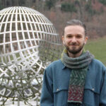 Photo of Isaac Sundberg, a postdoctoral fellow at the Max Planck Institute for Mathematics in Germany, who graduated from UWL in 2016 with a major in mathematics and a minor in computer science. Sundberg studies low-dimensional topology with a focus on 4D knot theory. Photo courtesy of Archives of the Mathematisches Forschungsinstitut Oberwolfach.