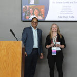 Photo of WiSys President Arjun Sanga presenting Grace Lewis, assistant professor of animal and food science at UW-River Falls, with the Carl E. Gulbrandson Innovator of the Year Award during a ceremony Thursday at UW-Superior. The award honors the research efforts of Lewis and five of her students. Contributed photo.