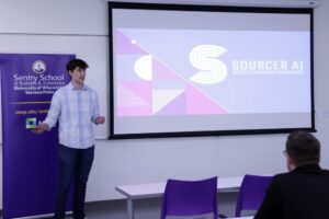 Photo of Suscha presenting his pitch, “Sourcer AI – Article Integrity Companion,” at the UW-Stevens Point WiSys Quick Pitch competition May 3.