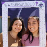 Photo of Maribel Rodriguez (left) and Alma Diaz-Cosme posing for a photo outside of Hyland Hall on the first day of classes for the fall semester on Sept. 3, 2024. (Photo courtesy of Diaz-Cosme and Rodriguez)