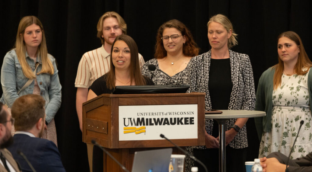Photo of staff from the UW-Whitewater Children's Center; Director and Lead Teacher Chelsea Newman accepts the award on behalf of the program.