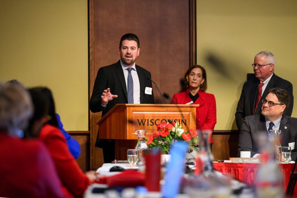 Photo of Matt Maryl, vice president for strategy performance & partnerships at American Family Insurance, speaking as his company and the UW–Madison were awarded the Regent Business Partnership Award during the Board of Regents meeting hosted at Union South at the University of Wisconsin–Madison on Feb. 7, 2025. The Business Partnership Award was created several years ago to highlight the mutually beneficial relationships between the Universities of Wisconsin and Wisconsin’s business community. (Photo by Althea Dotzour / UW–Madison)